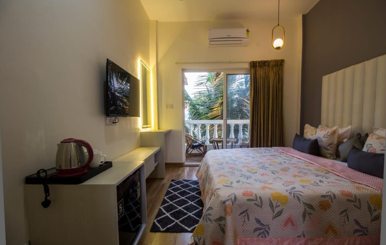 The Me Ra Kee House Hotel Morjim Buitenkant foto