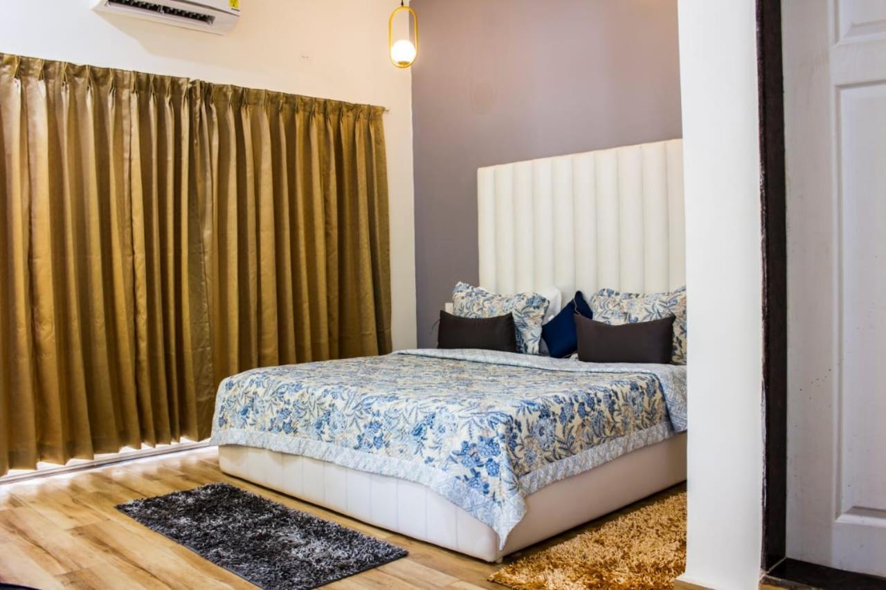 The Me Ra Kee House Hotel Morjim Buitenkant foto